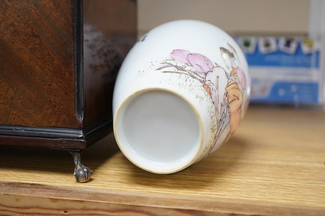 A Chinese famille rose vase, decorated with Shou Lao and script, 23cm